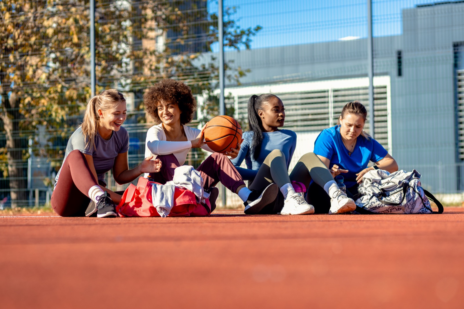 Young athlete completing a guided reflection on a phone after practice